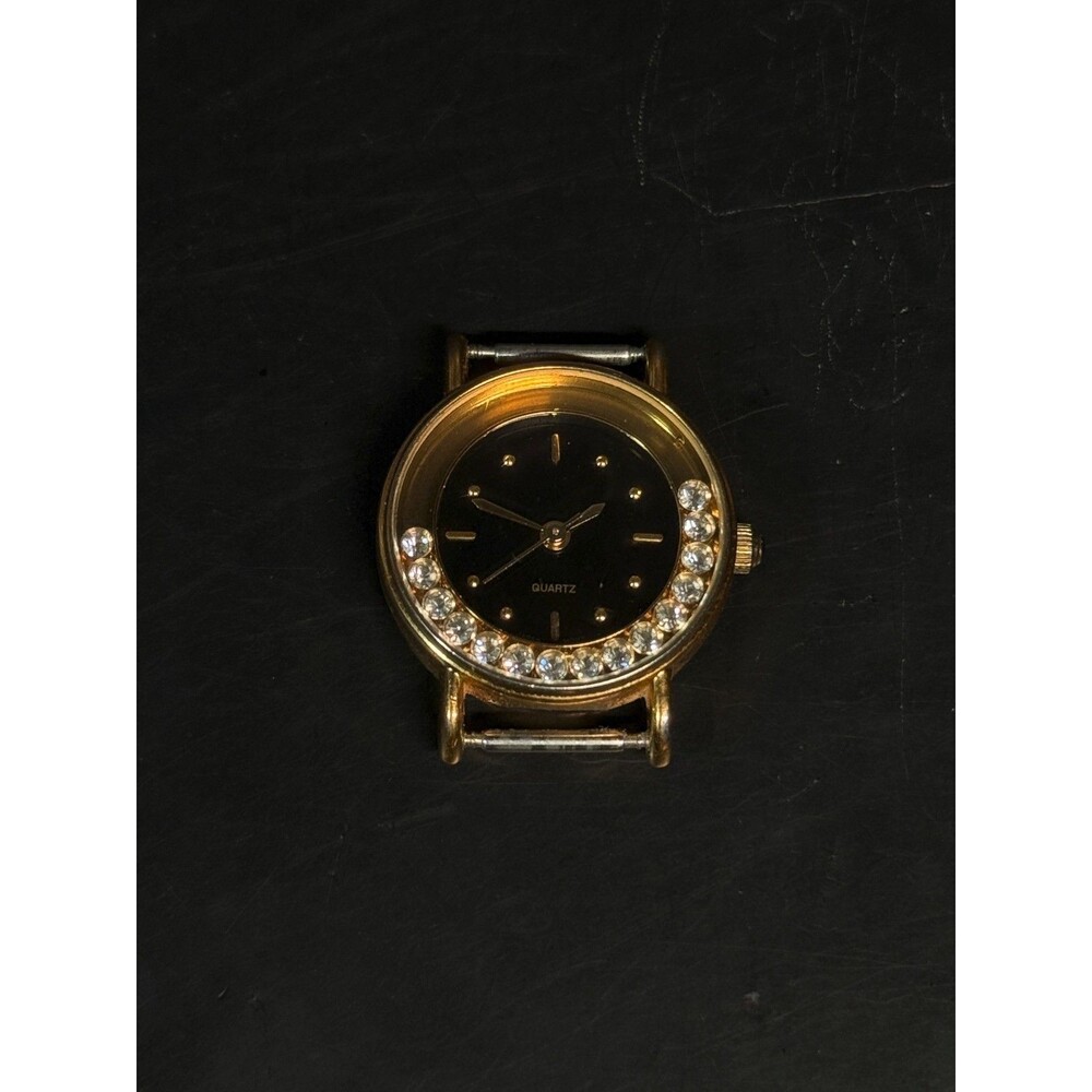 Avon Floating Crystal Quartz Watch Gold Tone Black Dial Stainless Back